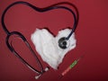 The medical concept phonendoscope listens to a heart made of cotton wool. blank for designers. medicine Royalty Free Stock Photo