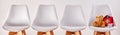 Row of chairs with teddy bear and first aid kit Royalty Free Stock Photo