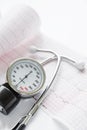 Medical manometer, cardiogram and stethoscope Royalty Free Stock Photo