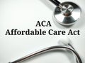 Medical concept.Text ACA Affordable Care Act with stethoscope. Royalty Free Stock Photo