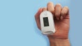 Medical device for hypoxia. Female finger in a pulse oximeter