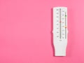 Medical device peak flow meter on a pink background Royalty Free Stock Photo