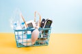 medical devices for home use in a small blue shopping basket