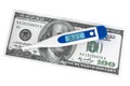 Medical digital thermometer with money Royalty Free Stock Photo