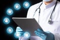 Medical doctor with digital tablet, Medicine doctor  hand touching icon medical network connection with modern virtual screen Royalty Free Stock Photo