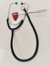 The medical doctor equipment stethoscope and triangle reflection hammer