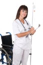 Medical doctor and handicaped chair Royalty Free Stock Photo