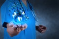 Medical Doctor holding a world gobe in her hands Royalty Free Stock Photo