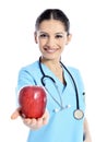 Medical doctor showing apple Royalty Free Stock Photo