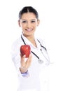 Medical doctor showing apple Royalty Free Stock Photo