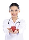 Medical doctor showing apple Royalty Free Stock Photo