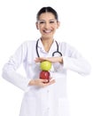 Medical doctor showing apple Royalty Free Stock Photo