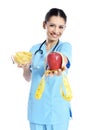 Medical doctor showing apple and potato chips Royalty Free Stock Photo