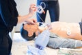 Medical doctor specialist expert displaying method of patient intubation technique on hands on medical education