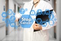 Medical Doctor with stethoscope and Stop Cancer sign in Medical Royalty Free Stock Photo