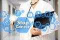 Medical Doctor with stethoscope and Stop Cancer sign in Medical Royalty Free Stock Photo