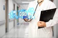 Medical Doctor with stethoscope and word GERD, Gastroesophageal Royalty Free Stock Photo