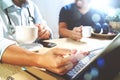 Medical doctor team taking coffee break.using digital tablet doc Royalty Free Stock Photo