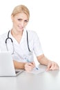 Medical doctor woman filling out prescription