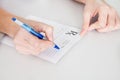 Medical doctor woman filling out prescription