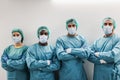 Medical doctors looking at camera inside hospital corridor - Main focus on african man face Royalty Free Stock Photo