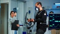 Medical doctors in sports science lab measuring performance cardiorespiratory Royalty Free Stock Photo