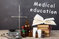 Medical education concept - books, pharmacy bottles, stethoscope Royalty Free Stock Photo
