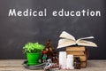 Medical education concept - books, pharmacy bottles, stethoscope Royalty Free Stock Photo