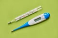 Medical electronic and mercury thermometers close-up