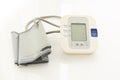 Medical electronic tonometer on white medical table as a background