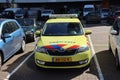 Medical emergency vehicles in yellow color on the street of Rotterdam