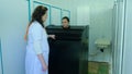 Medical equipment. Cryotherapy. Cryotherapy capsule in cosmetological clinic. Young woman in a full body cryotherapy