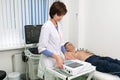 Medical equipment for electrocardiogram. Doctors doing ECG test on male patient. Diagnostic heart disease heart attack