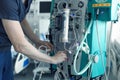 medical equipment in the intensive care unit in the hospital, a ventilator, a technician adjusts the equipment in intensive care Royalty Free Stock Photo