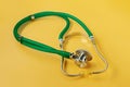 Medical equipment. stethoscope on yellow copy space background