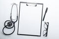 Medical equipment and technology concept. Case history and stethoscope