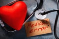 Medical error concept: stethoscope and heart shaped object Royalty Free Stock Photo