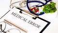 MEDICAL ERROR text and Background of Medicaments, Stethoscope Royalty Free Stock Photo