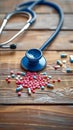 Medical essentials Stethoscope, pills, medicine, treatment on wooden background