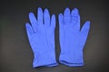 Medical examination gloves on black background