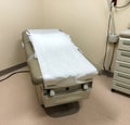 Medical Examination and Treatment Table or Chair in a doctors office Royalty Free Stock Photo