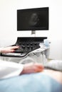 medical examining pregnant belly by ultrasonic scan Royalty Free Stock Photo