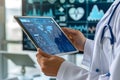 Medical experts analyze health statistics on digital tablets, It is modern health care with advanced information technology