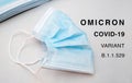 Blue mask, covid-19 Omicron variant B.1.1.529 Royalty Free Stock Photo