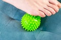 Medical foot massager. Removal of fatigue on the legs, relaxation. Home physiotherapy. Close-up Royalty Free Stock Photo
