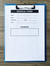 Medical form with patient data on doctor`s desk Royalty Free Stock Photo