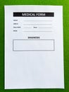 Medical form with patient data on doctor`s desk Royalty Free Stock Photo