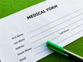 Medical form with patient data on doctor`s desk Royalty Free Stock Photo