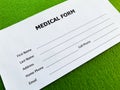 Medical form with patient data on doctor`s desk Royalty Free Stock Photo