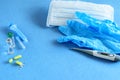 Medical gloves, mask, disposable syringe and pills with vaccine against the virus. Minimum set against the virus and flu Royalty Free Stock Photo